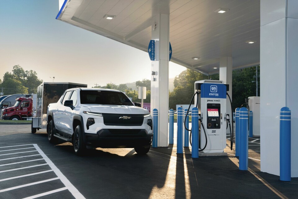 The GM Silverado EV at a Pilot charging station gm-pilot-new-ev-charging-network-02