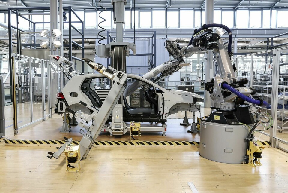 A VW e-Golf being assembled at the Dresden Transparent Factory e-Golf Dresden Transparent Factory