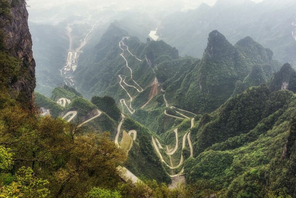 When it gets to Tianmen the ID.R will have 99 hairpin bends to race up tianmen mountain winding road - shutterstock_415629250_web
