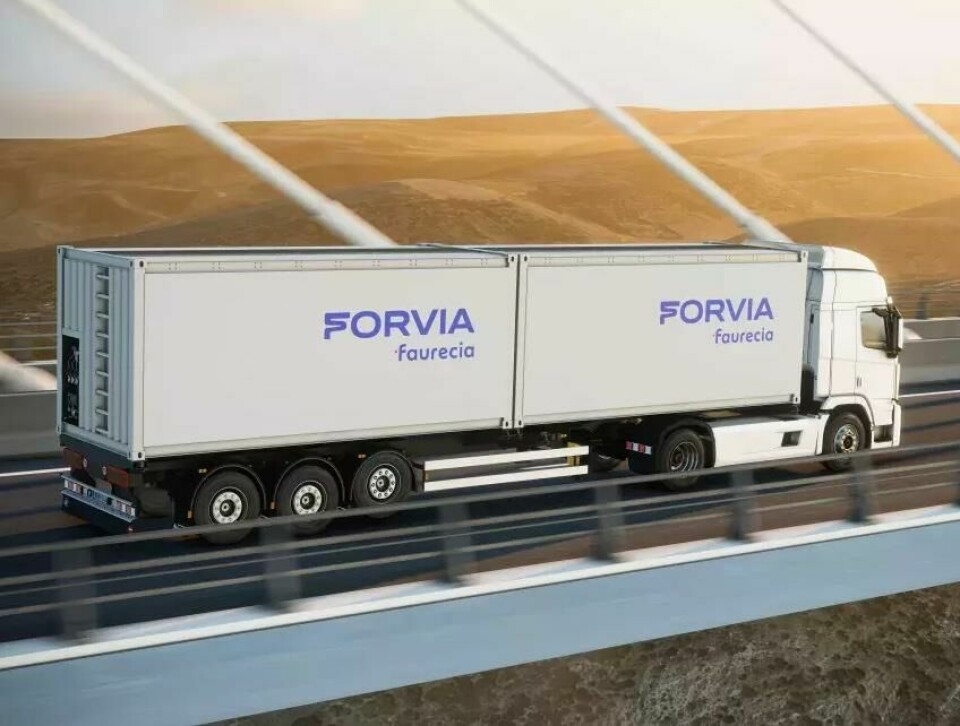Forvia is using track and trace technology to monitor the global flow of parts Forvia Container on truck_bridge copy