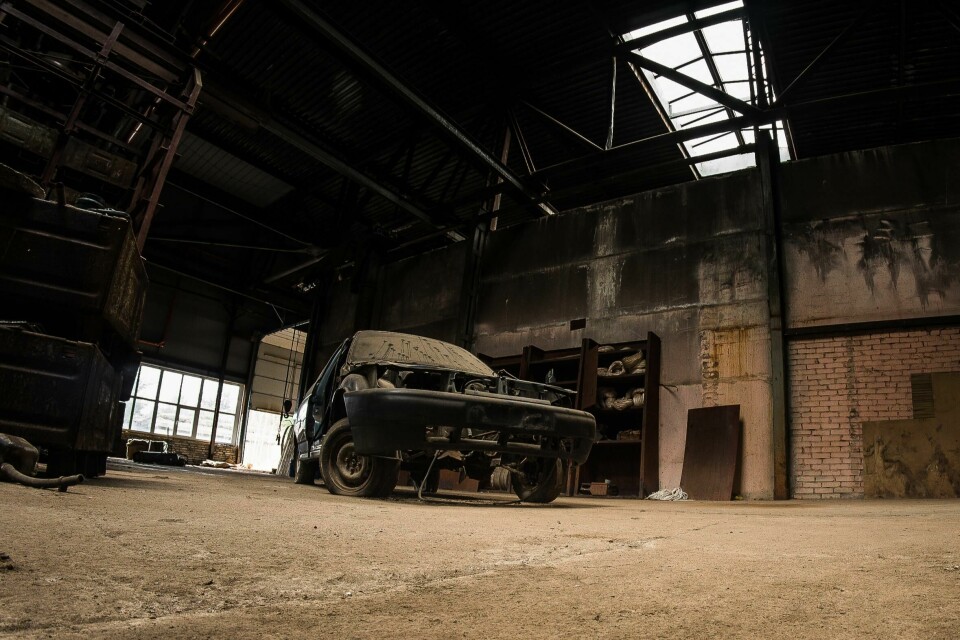 Iran’s automotive industry left to rust Rusting car in warehouse