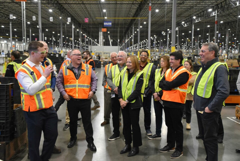 GM chair and CEO Mary Barra and GM President Mark Reuss (far right) tour the CCA Davison Road Processing Center with other GM colleagues gm-cca-burton-investment-02