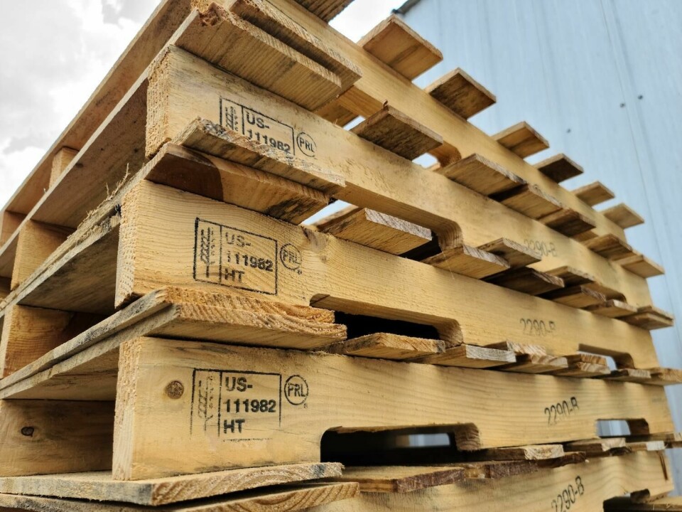 All pallets used for internatinal shipments need to be heat treated and stamped with the appropriate ISPM 15 heat treatment code Stack of heat treated wooden pallets
